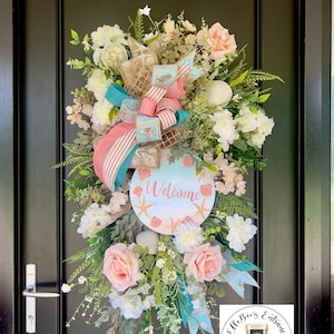 Beachy Summer Welcome Wreath | Nautical Front Door Decor | Coastal Cottage Wreath | Coral & Aqua Faux Floral Swag with a shore Welcome Sign.