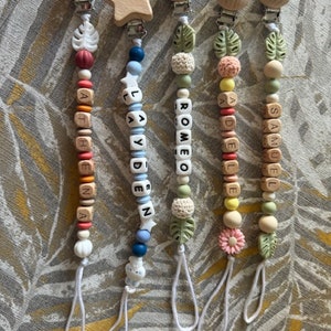 Personalized pacifier clip