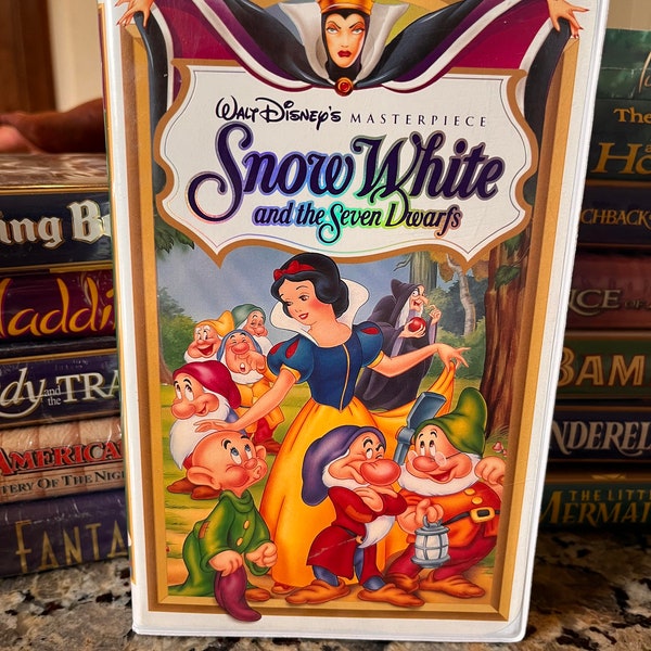 Snow White and the Seven Dwarfs VHS with RARE stickers and original 1994 Disney flyers