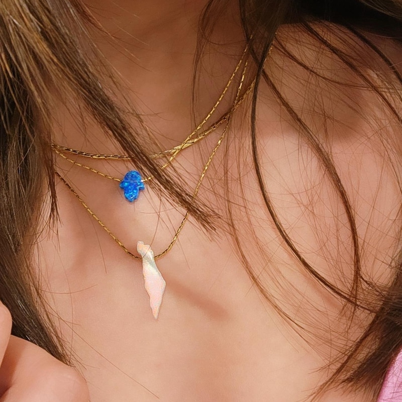 Beautiful Necklace with Hamsa Pendant.