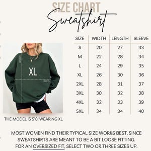 May include: A dark green Gildan 18000 sweatshirt with an XL size label. The image includes a size chart with measurements in inches for width, length, and sleeve length. The model is 5'8" and wearing an XL. Text on the image advises on sizing.