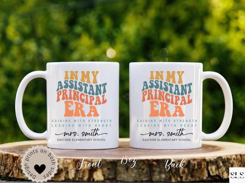 May include: Two white ceramic mugs with a colorful retro design that says "In My Assistant Principal Era" with the text "Guiding with Strength Leading with Heart" and the name "mrs. smith" and the text "Eastside Elementary School".