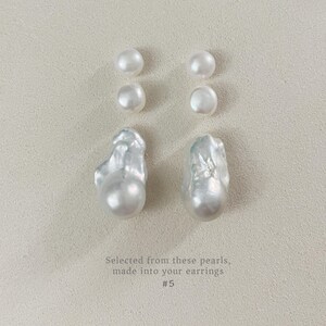 May include: A selection of white pearls, comprising four small, round pearls and two large, uniquely shaped baroque pearls. The text states: "Selected from these pearls, made into your earrings #5."