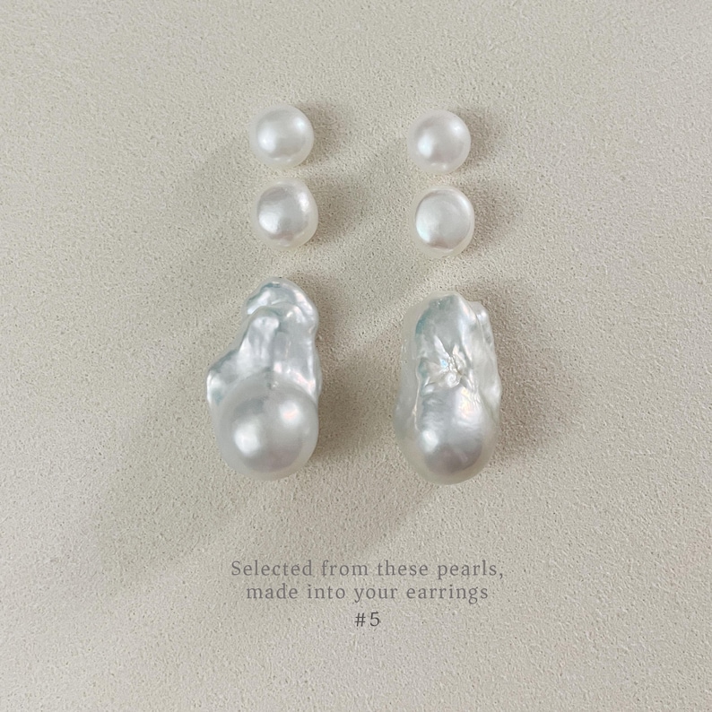 May include: A selection of white pearls, comprising four small, round pearls and two large, uniquely shaped baroque pearls. The text states: "Selected from these pearls, made into your earrings #5."