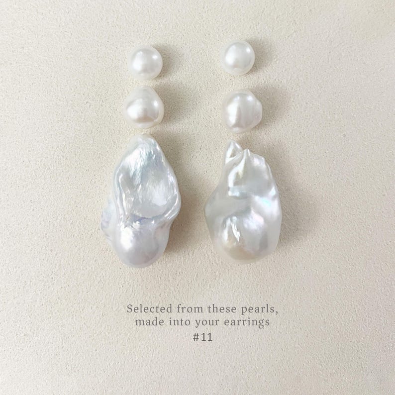May include: An assortment of white pearls, ranging from small, round ones to larger, uniquely shaped baroque pearls. The image features the text: "Selected from these pearls, made into your earrings #11."