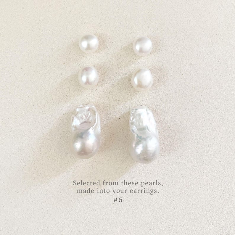 May include: Six white pearls of different shapes and sizes are arranged on a light background. The pearls vary from small, round ones to larger, irregular baroque pearls. Text at the bottom reads: "Selected from these pearls, made into your earrings. #6"