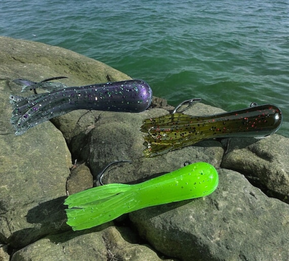 4-pack 2.5'' G.O. Tube with  1- 1/8oz  jig head with 3/0 hook.