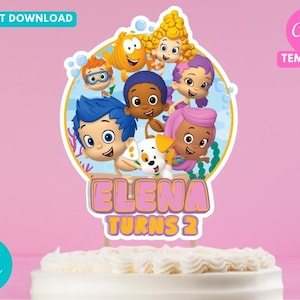 May include: A cake topper featuring cartoon characters from the Bubble Guppies show. The topper has the text "ELENA TURNS 2" in pink and yellow. The background is a light pink colour. The words "INSTANT DOWNLOAD" and "Canva TEMPLATE" are also visible.