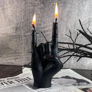 Gothic decor featuring the bold black wax candle as a centerpiece