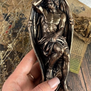 Handcrafted beeswax candle with bronze finish, ideal for sacred rituals and esoteric practices