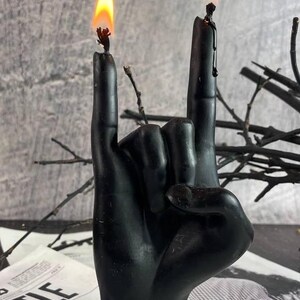 Statement candle adding drama to a wedding or event setting
