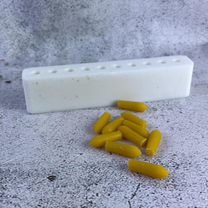 Compact silicone mold ready for herbal remedy crafting