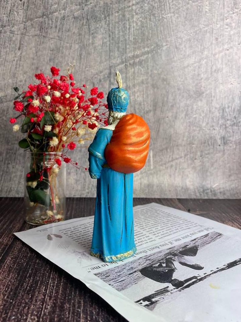 Detailed Saint Nicholas candle for festive candlelight and home blessings