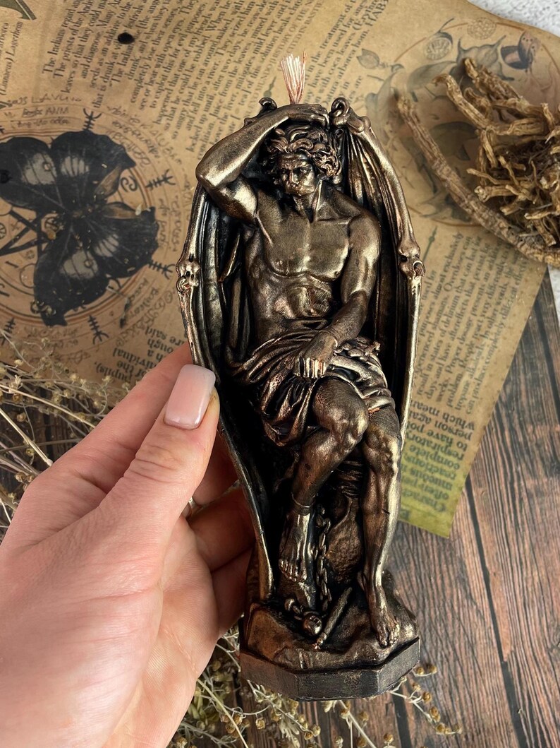 Symbolic bronze candle for witchcraft and energy work, handmade with a natural wax base