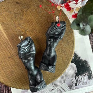 A side by side comparison of Classic Black vs Silver Finish candles