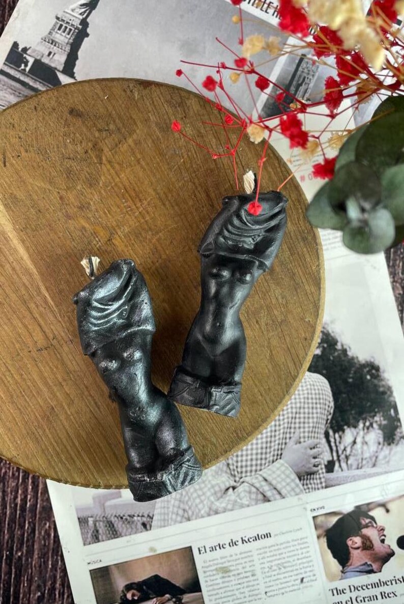 A side by side comparison of Classic Black vs Silver Finish candles