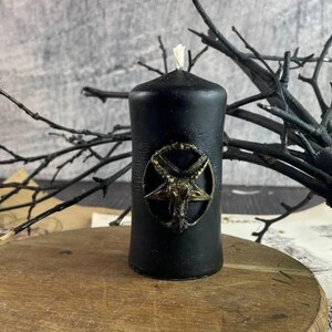 The Baphomet candle in spiritual meditation space for deep reflection