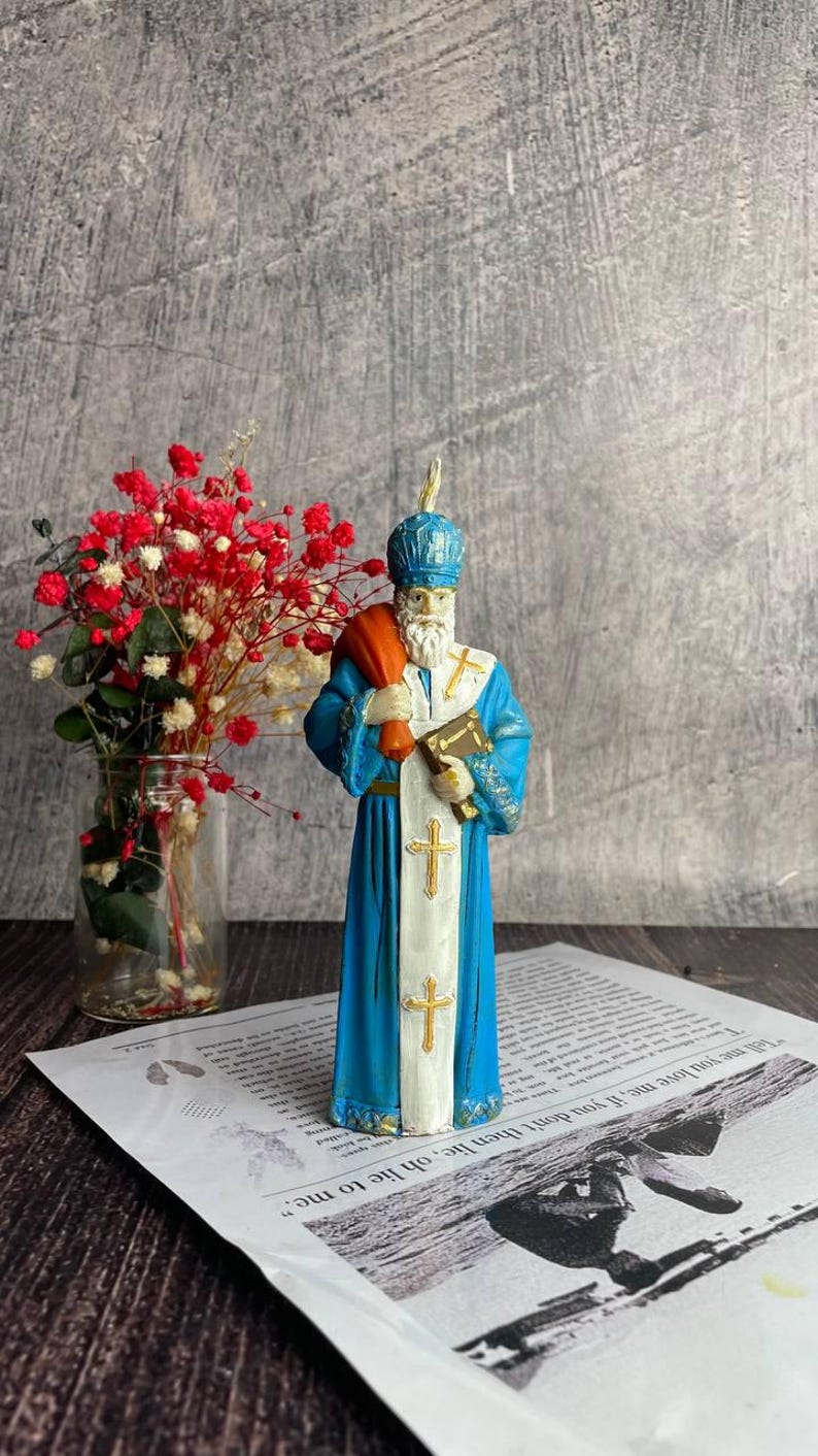 Sacred holiday candle with a warm glow for spiritual and Christmas traditions