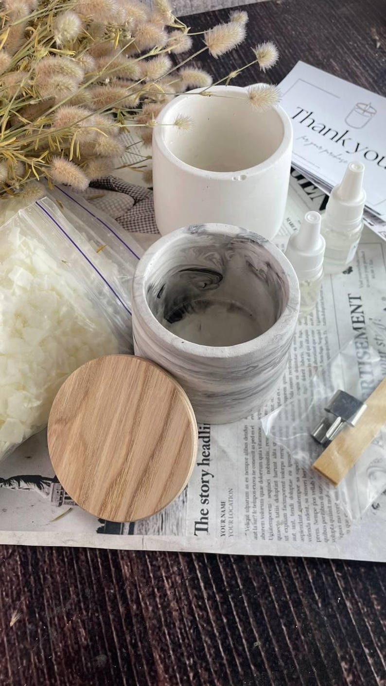 Two marble jars with soy wax candle kit, perfect for home craft projects.