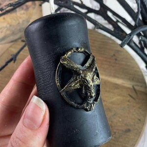 Close-up of the Baphomet Ritual Candle on an altar with mystical elements