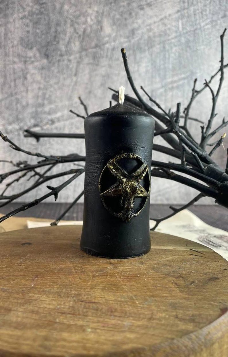 Dark occult altar setup featuring candles, tarot, and spiritual artifacts