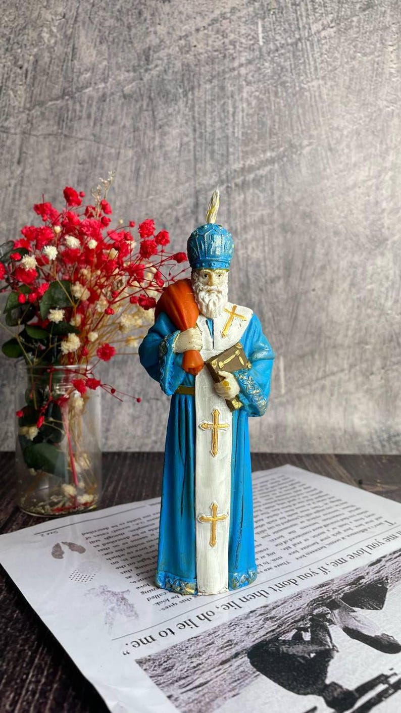 Religious decor candle made from eco-friendly beeswax, celebrating Saint Nicholas