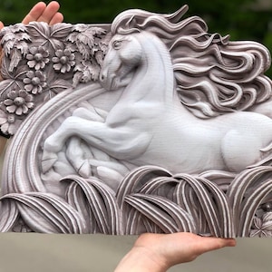 May include: A white wooden wall sculpture of a horse with flowing mane and tail, carved in a detailed style. The horse is surrounded by carved leaves and flowers, creating a whimsical and elegant design.