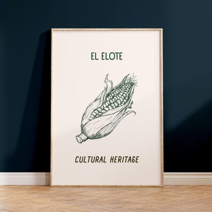 Puede incluir: Una impresión enmarcada con un dibujo de línea verde de una mazorca de maíz sobre un fondo blanco. El texto "EL ELOTE" está por encima del dibujo y "CULTURAL HERITAGE" está por debajo del dibujo.