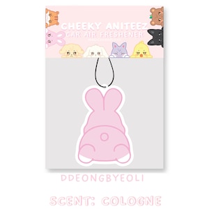 May include: Pink bunny-shaped car air freshener with the text "CHEEKY ANITEEZ CAR AIR FRESHENER" and "DDEONGBYEOLI" and "SCENT: COLOGNE" on the packaging.