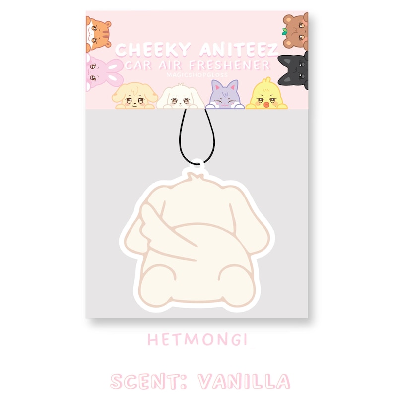 May include: White car air freshener shaped like a dog with a pink background. The text "CHEEKY ANITEEZ CAR AIR FRESHENER" is at the top of the image. The text "HETMONGI" is at the bottom of the image. The text "SCENT: VANILLA" is at the bottom of the image.