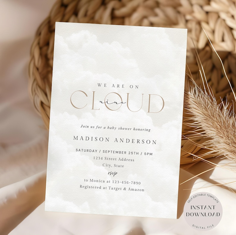 May include: A white baby shower invitation with a watercolor cloud background. The text reads "We are on cloud nine" and includes the name "Madison Anderson", the date "September 25th", and the time "5pm".