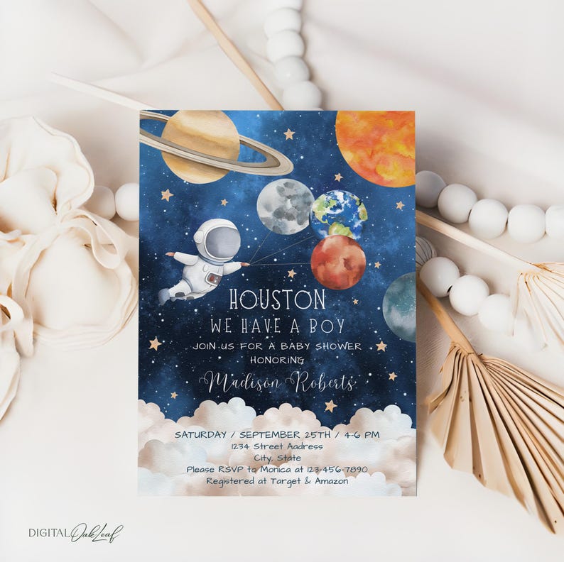 May include: A blue and white baby shower invitation with a watercolor illustration of an astronaut holding balloons shaped like planets. The text reads "Houston, We Have A Boy" and includes the name "Madison Roberts".