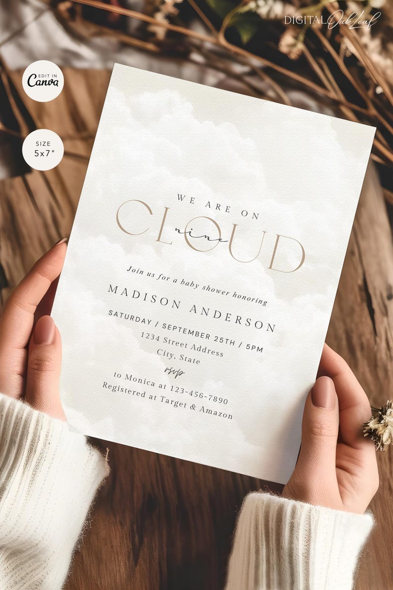 May include: A white baby shower invitation with a watercolor cloud background. The text reads "We are on Cloud nine" and includes the name "Madison Anderson", the date and time of the shower, and the address. The invitation also includes RSVP information and registry details.