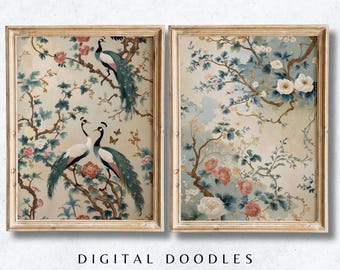 May include: Two framed Chinoiserie prints featuring birds, flowers, and branches in soft pastel colors. The left print shows two cranes and a peacock, while the right print displays flowers. The frames are light wood. Text at the bottom reads "DIGITAL DOODLES CHINOISERIE PRINTS".