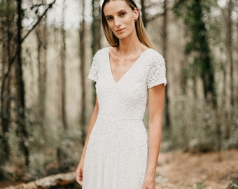 Robe de mariée coupe & flair longue à manches courtes - broderie de sequins