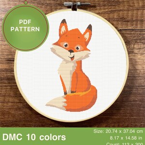 May include: A cross stitch pattern featuring a cartoon fox with a white background. The pattern is in a hoop and the text "PDF PATTERN" is visible in the top left corner. The text "DMC 10 colours" is visible at the bottom left corner. The text "Size: 20.74 x 37.04 cm, 8.17 x 14.58 in, Count: 112 x 200" is visible at the bottom right corner.