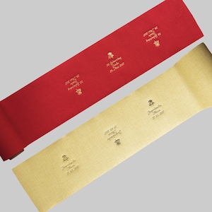 Könnte beinhalten: Zwei rote und goldene Scroll-Einladungen mit dem Text "50. Geburtstag Gisela 29. Mai 2017" und "Jugendweihe Alexa 27.05.2017".
