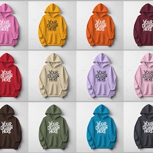 May include: A mockup of ten different colored hoodies with the text "YOUR DESIGN HERE" printed on the front. The hoodies are all in a relaxed fit and have a drawstring hood.