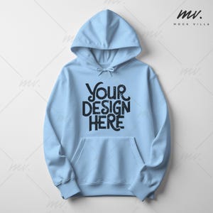 May include: A light blue hoodie with a drawstring hood and a front pocket. The text "YOUR DESIGN HERE" is printed in black across the front. The hoodie is a casual garment.