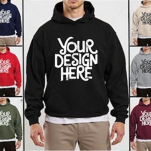 May include: A black hoodie with a white graphic that says "YOUR DESIGN HERE" in a distressed font. The hoodie has a drawstring hood and a kangaroo pocket.