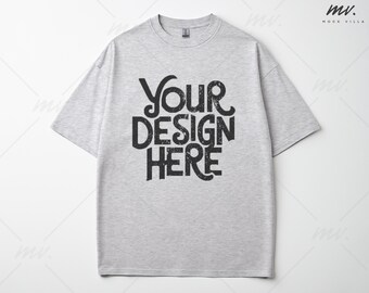 May include: A gray t-shirt with the text "YOUR DESIGN HERE" printed in black.