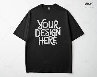May include: Black t-shirt with short sleeves and a crew neck. The shirt has the text "YOUR DESIGN HERE" printed on the front in a white distressed font.