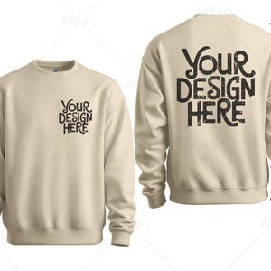 May include: A beige sweatshirt mockup with the text "Your Design Here" printed on the front and back. The sweatshirt has long sleeves and a crew neck.