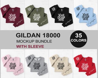 Può includere: Pacchetto di mockup di 35 colori di felpe con collo a girocollo Gildan 18000 a maniche lunghe. Le felpe sono mostrate in vari colori, tra cui rosso, verde, blu, nero, bianco e rosa. Il testo "YOUR DESIGN HERE" è stampato sul davanti di ogni felpa.