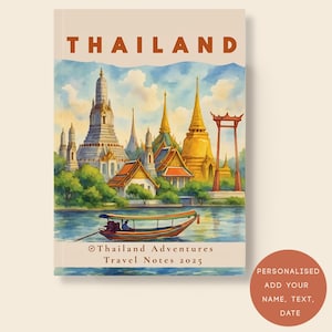 May include: A notebook featuring a watercolour illustration of Thai temples and a boat on the water. The word "THAILAND" is printed at the top. The text "Thailand Adventures Travel Notes 2025" is printed at the bottom.