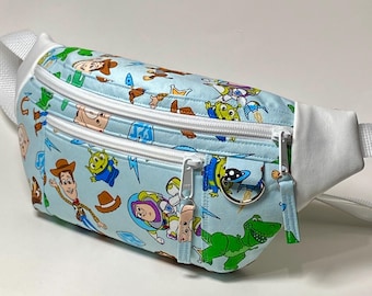 Toy themed fanny pack / waist bag with three zippered pockets
