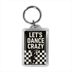 May include: A rectangular keychain with a silver key ring. The keychain features the text "LET'S DANCE CRAZY" in white on a black background. A black and white checkered pattern is at the bottom, with a stylized figure dancing.