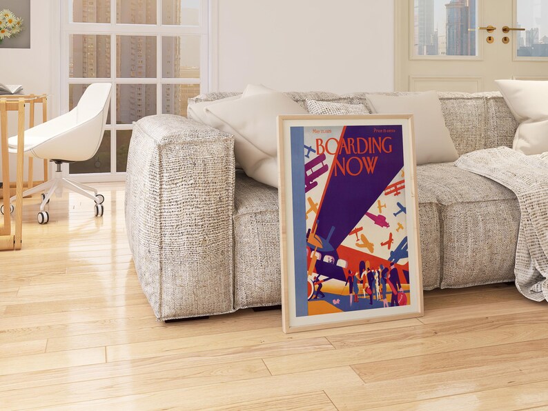 Boarding Now Airplane in a natural oak frame above a sofa in a living room