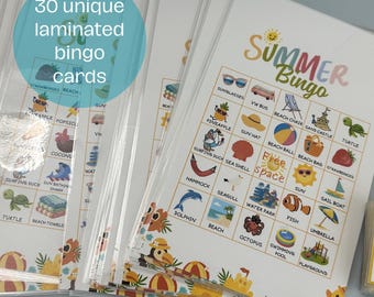 May include: A stack of laminated summer bingo cards. Each card features a grid with summer-themed images like sunglasses, a beach ball, and a turtle. The text "Summer Bingo" is at the top, and the cards are packaged in clear plastic.