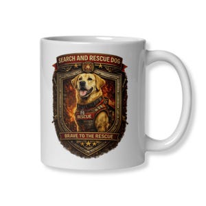 May include: White ceramic mug featuring a graphic of a golden Labrador search and rescue dog. The dog is wearing a vest with the word "RESCUE". The mug has the text "SEARCH AND RESCUE DOG" and "BRAVE TO THE RESCUE".